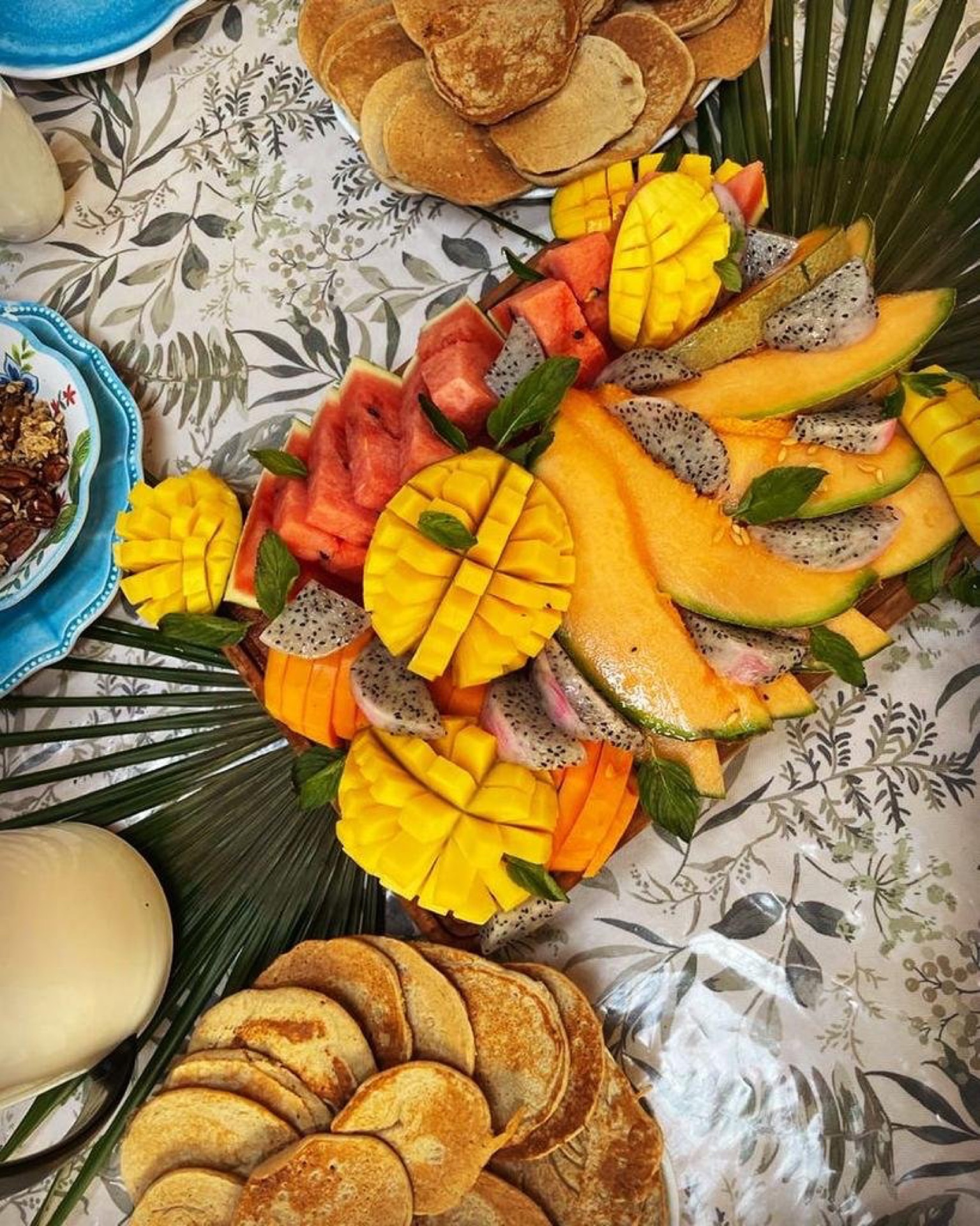 Tropical fruit platter with pancakes